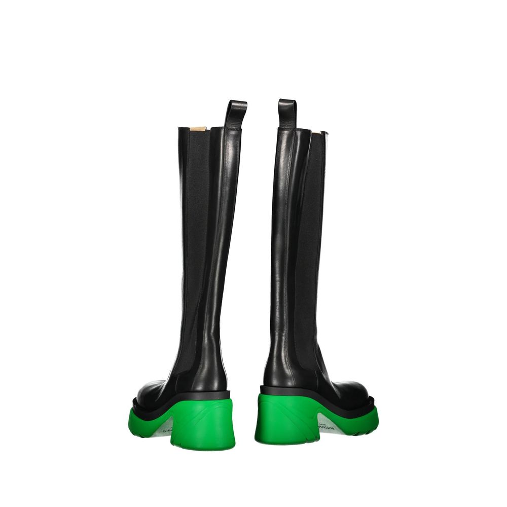 Black over-the-knee leather boots