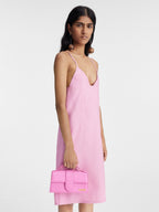 Le Grand Bambino neon pink leather bag