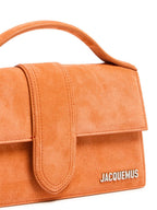 Le Grand Bambino terracotta leather top handle bag
