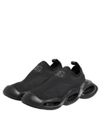 Black slip-on low-top sneakers