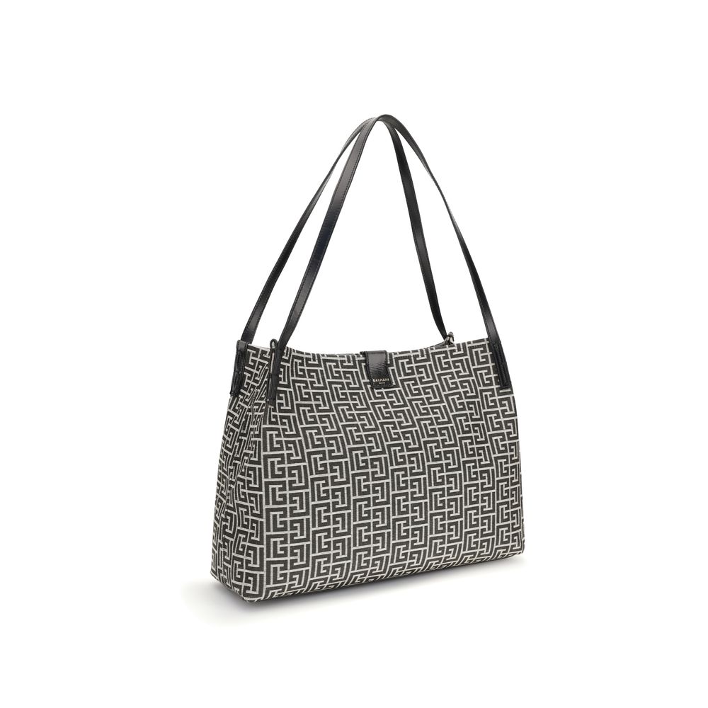 Tote bag with button closure