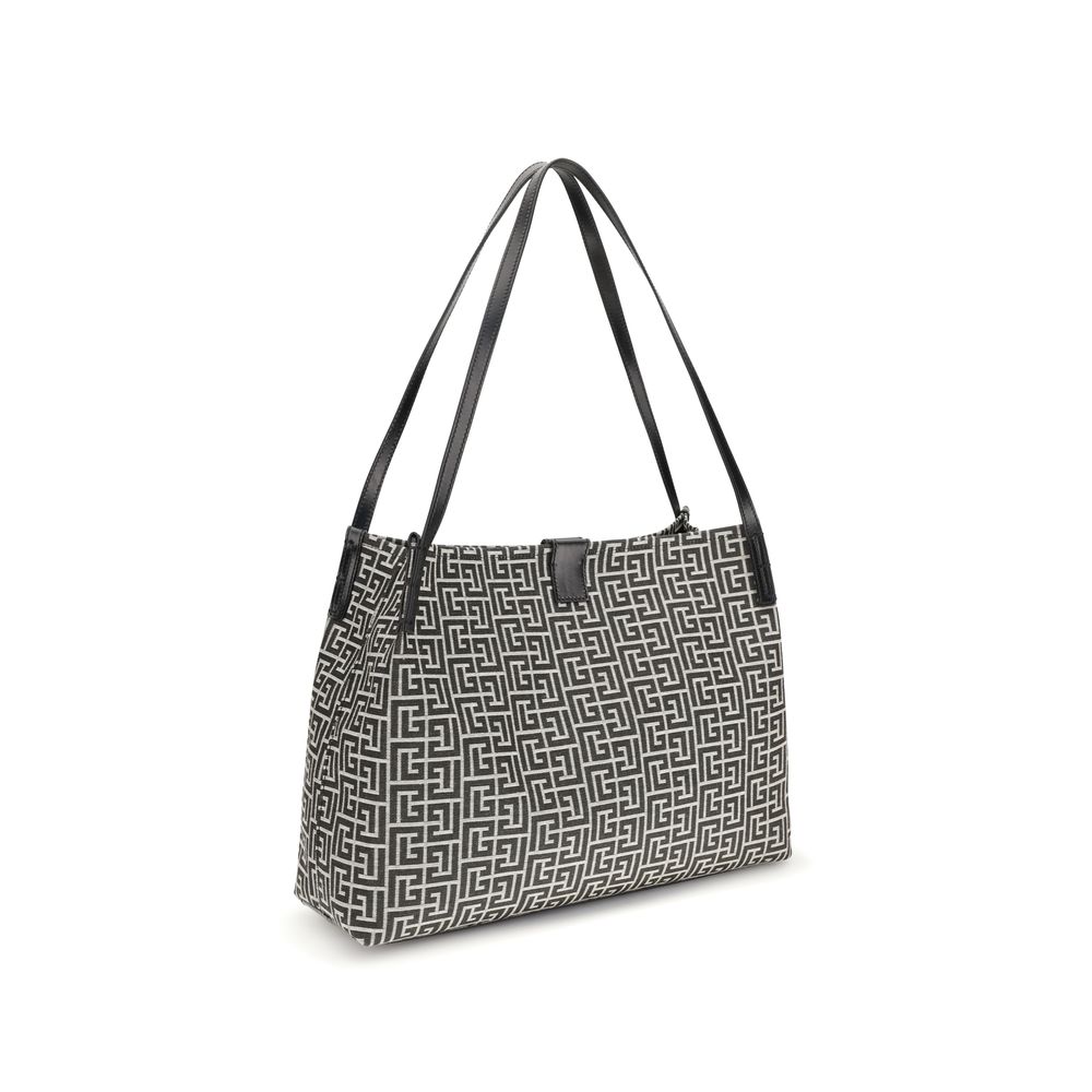 Tote bag with button closure