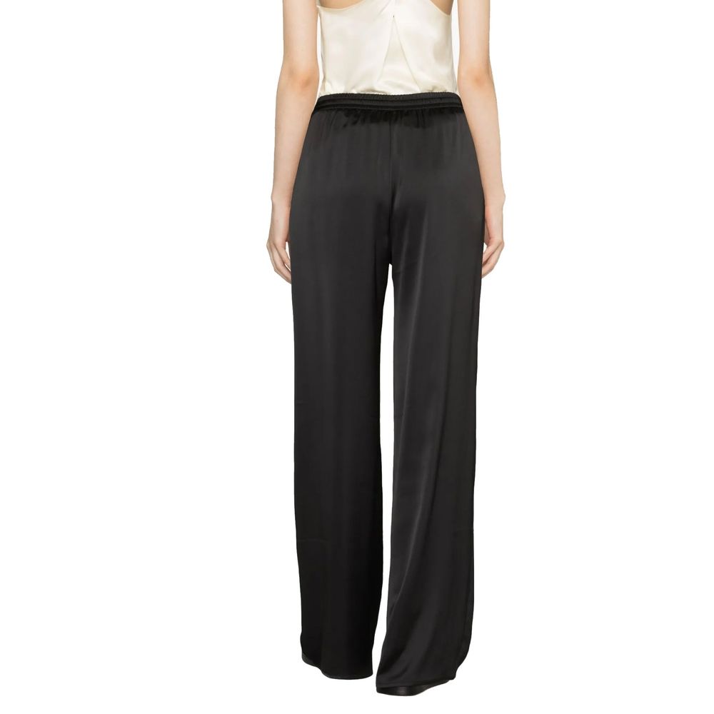 Trousers with an elastic insert