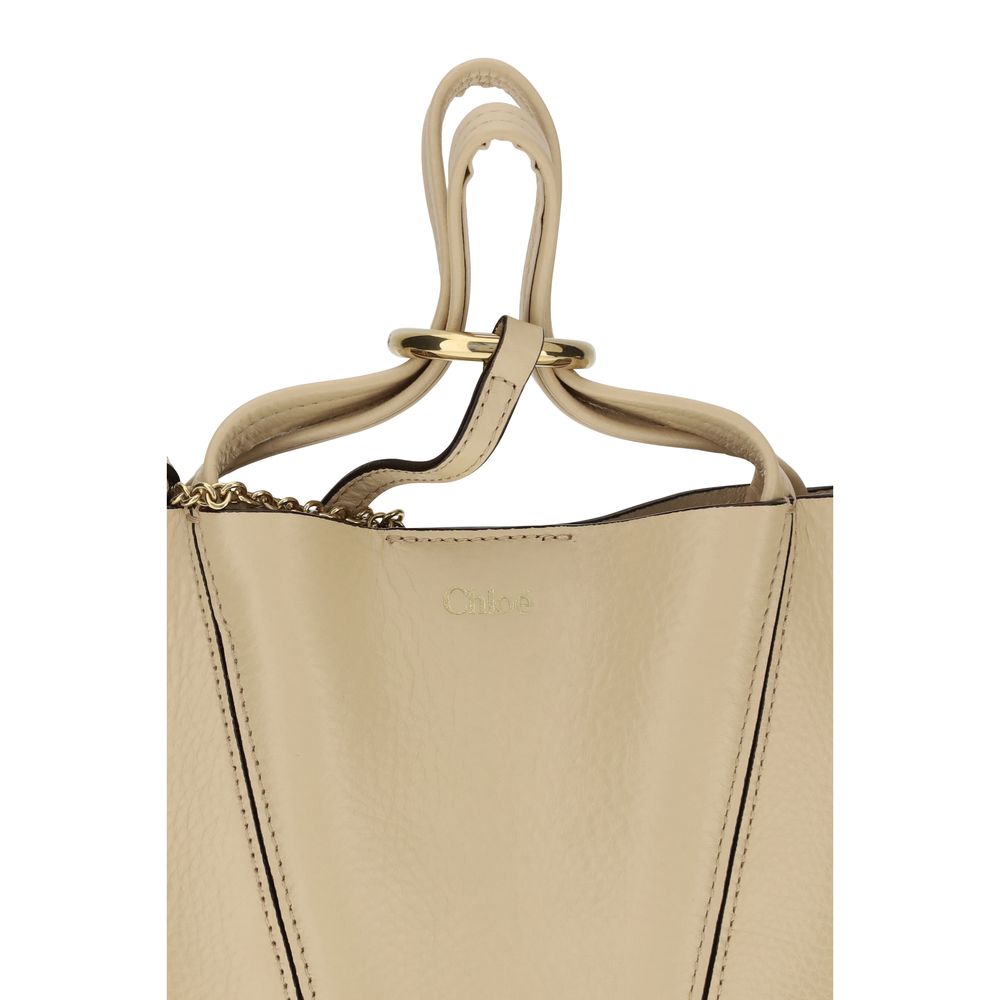 Spin shoulder bag