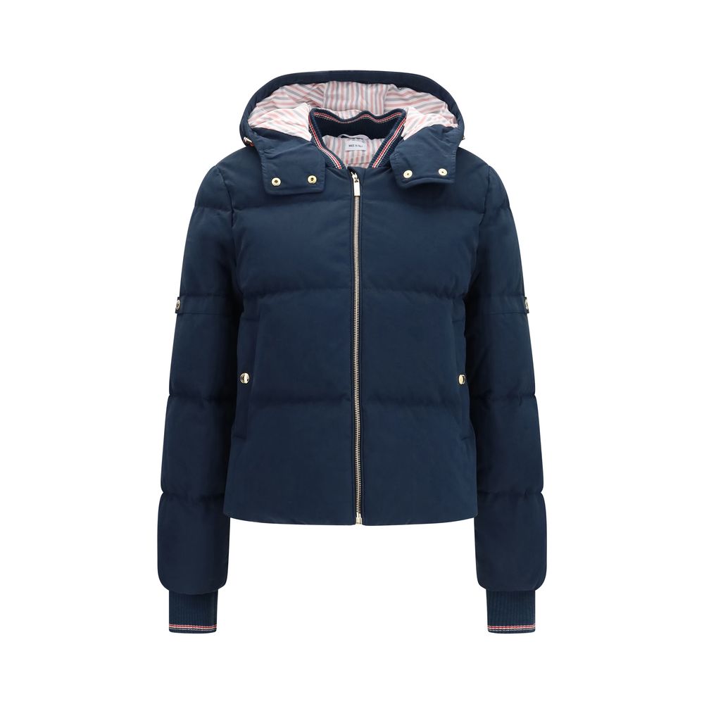 Hooded and waxed technical puffer jacket