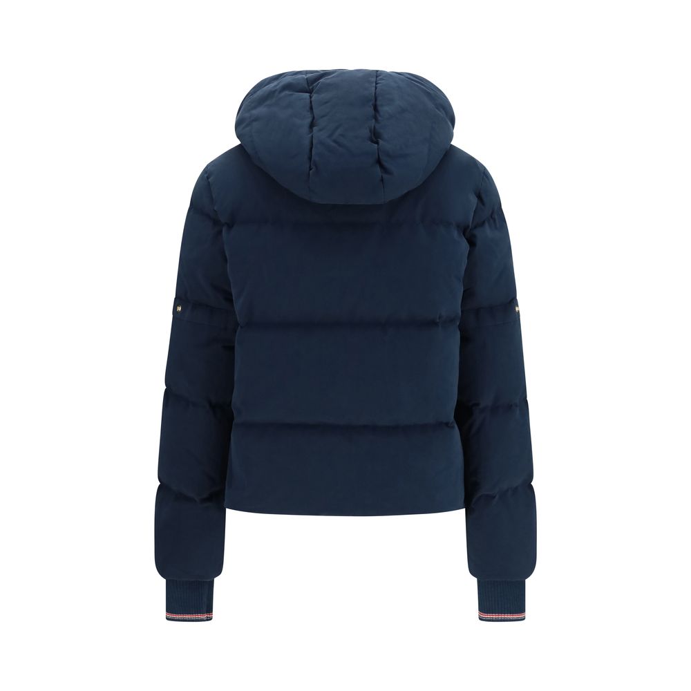 Hooded and waxed technical puffer jacket