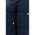 Hooded and waxed technical puffer jacket