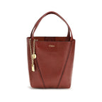 Spin shoulder bag