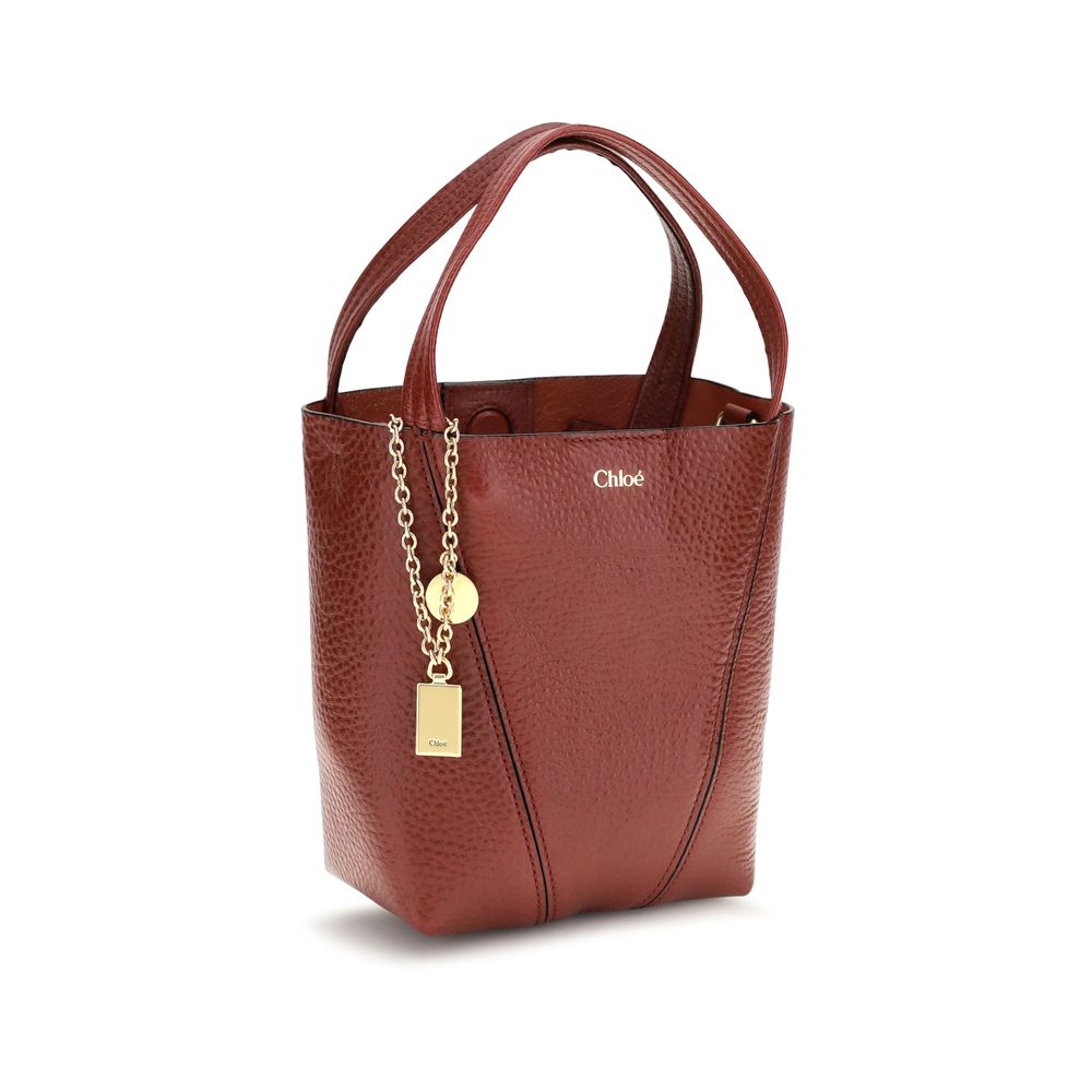 Spin shoulder bag
