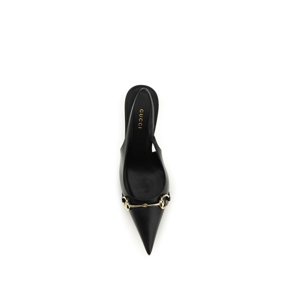 Décolleté slingback in pelle di capra con cinturino