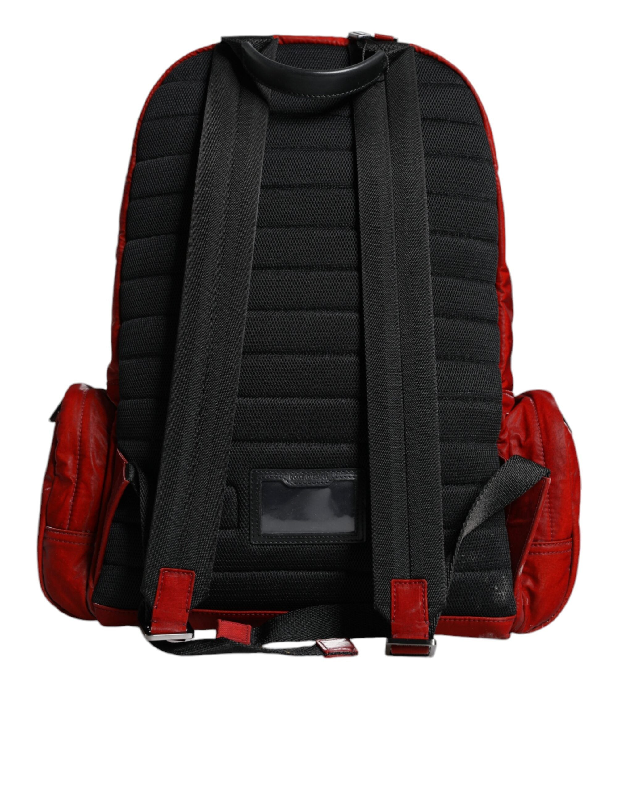 Backpack with red patent leather logo