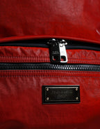 Backpack with red patent leather logo