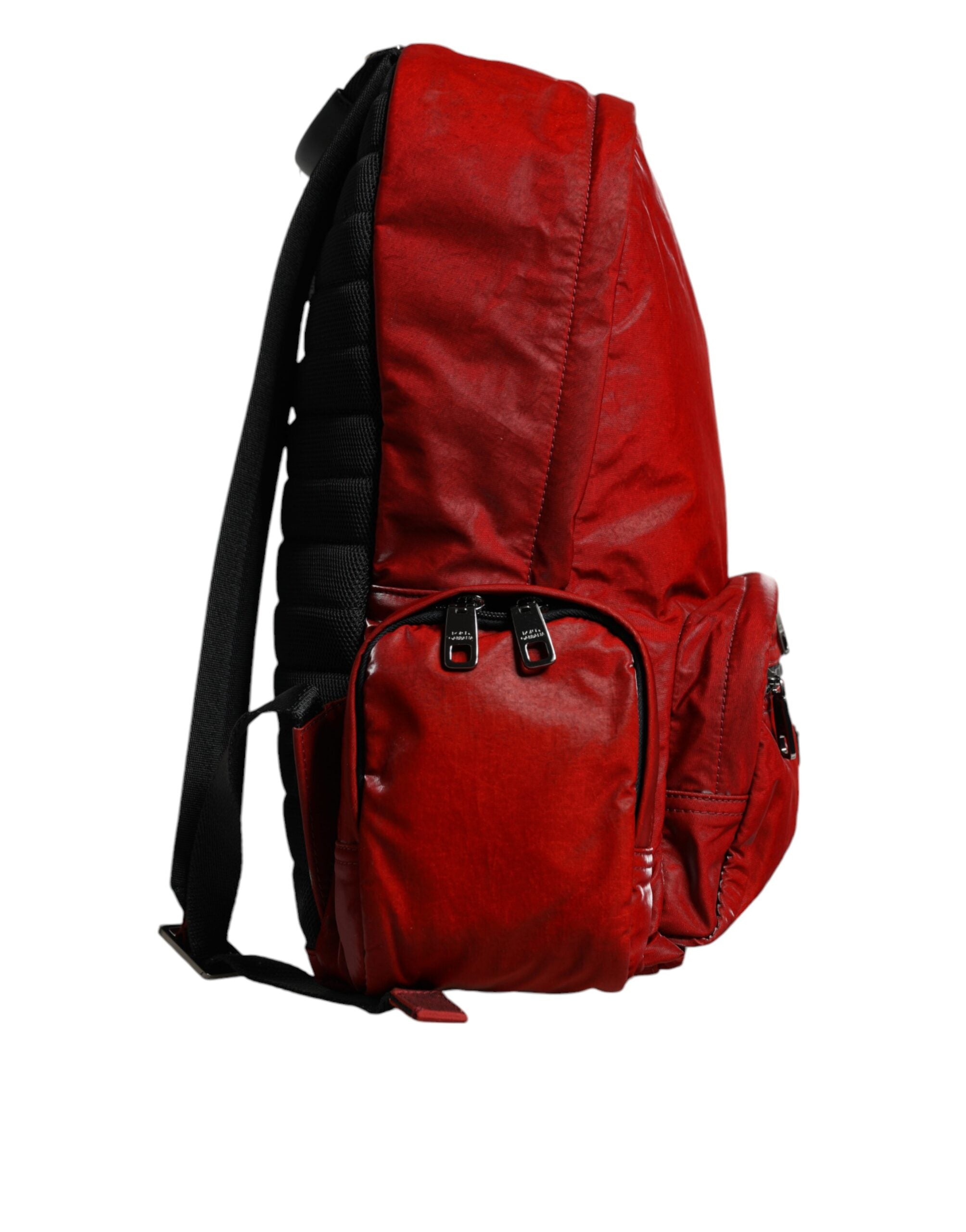 Backpack with red patent leather logo