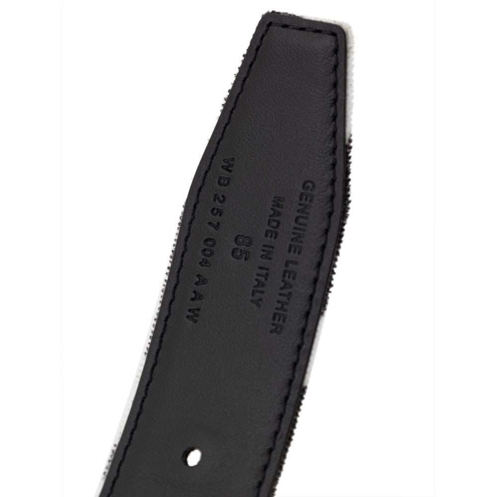 Belt featuring a crystal-encursted logo buckle