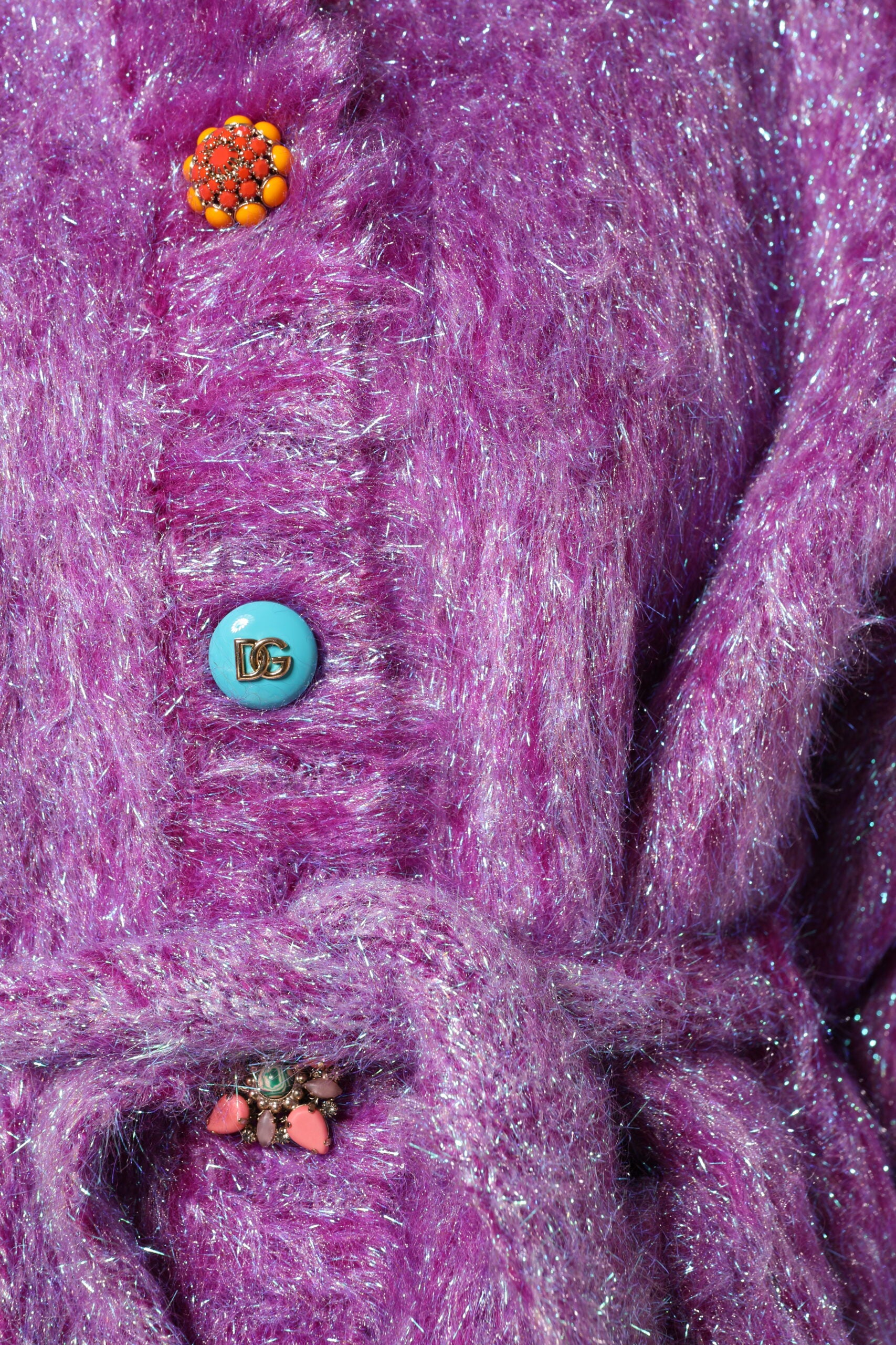 Trench coat with decorative purple buttons